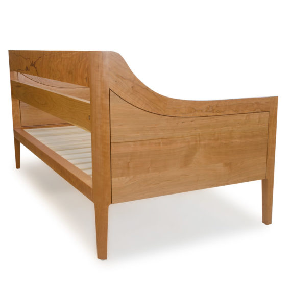 cherry day bed with sculpted joinery, mid century modern design