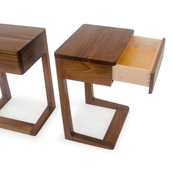 walnut nightstands with cantilever design, allows easy access to storage drawers